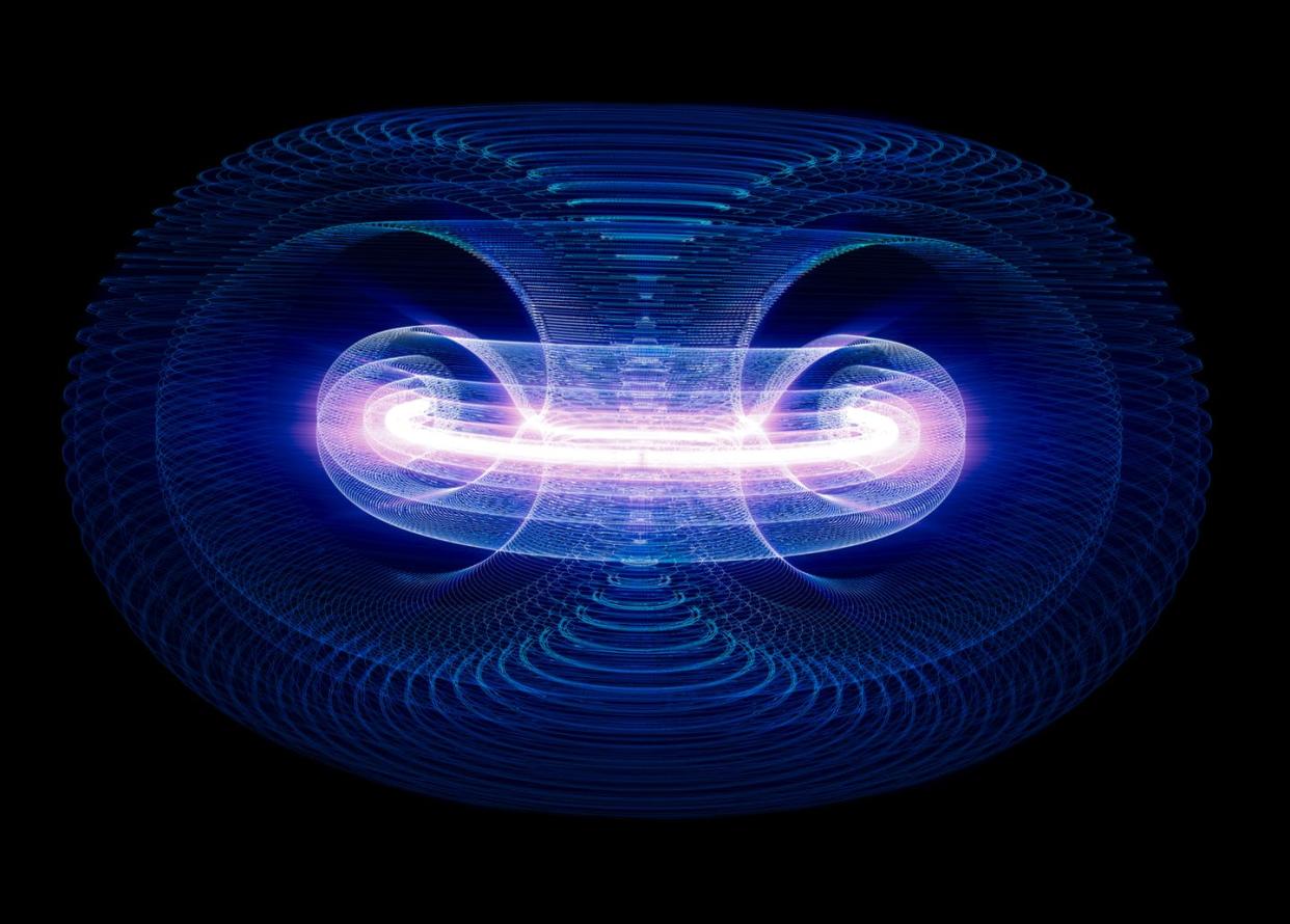 <span class="caption">Magnetic fusion reactors contain super hot plasma in a donut-shaped container called a tokamak.</span> <span class="attribution"><a class="link " href="https://www.gettyimages.com/detail/photo/high-energy-particles-flow-through-a-tokamak-or-royalty-free-image/1092180978?adppopup=true" rel="nofollow noopener" target="_blank" data-ylk="slk:dani3315/iStock via Getty Images;elm:context_link;itc:0;sec:content-canvas">dani3315/iStock via Getty Images</a></span>