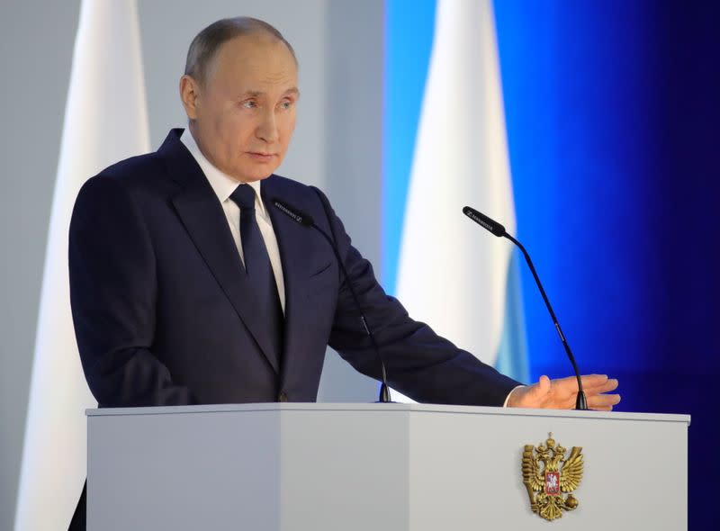 FILE PHOTO: Russian President Putin delivers his annual address to the Federal Assembly in Moscow