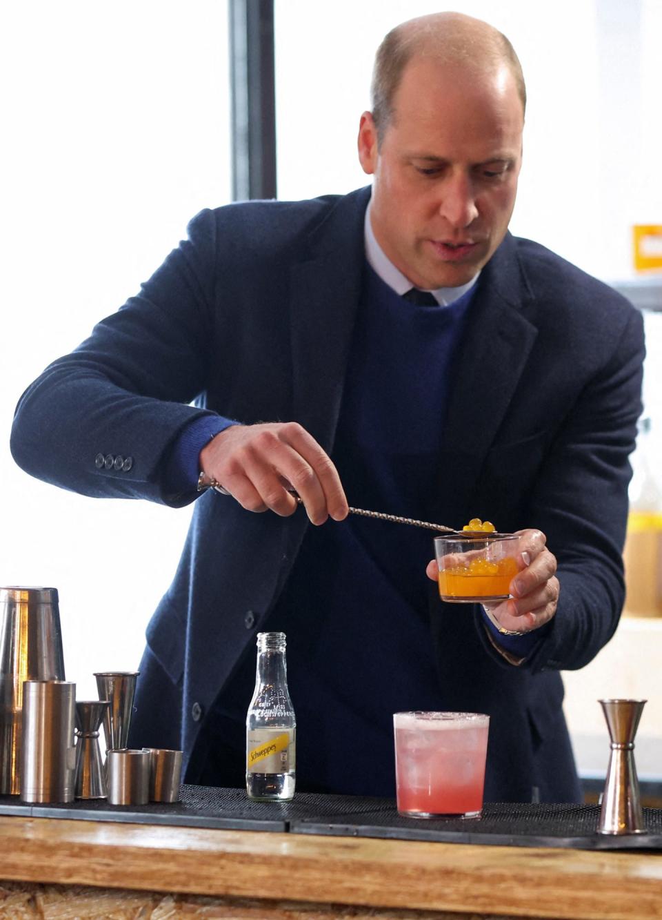 <p>William and Kate hopped behind the bar to see who could craft a cocktail faster at Trademarket, an outdoor street food and retail market situated in the heart of Belfast.</p>