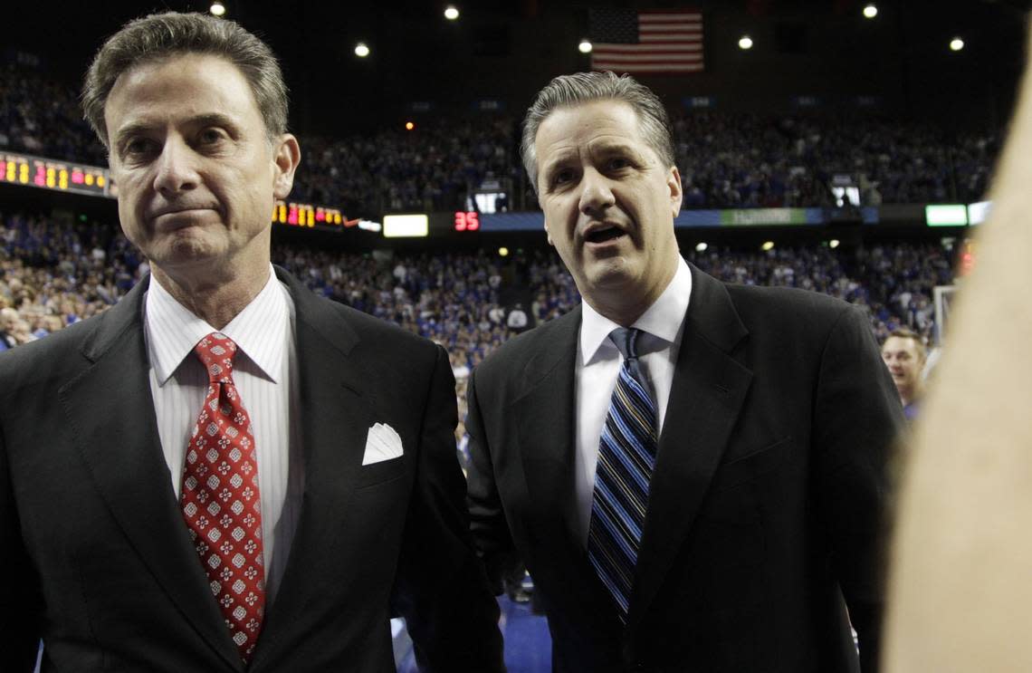 Rick Pitino, left, and John Calipari greet each other before the Louisville-Kentucky game in Rupp Arena on Dec. 28, 2013.