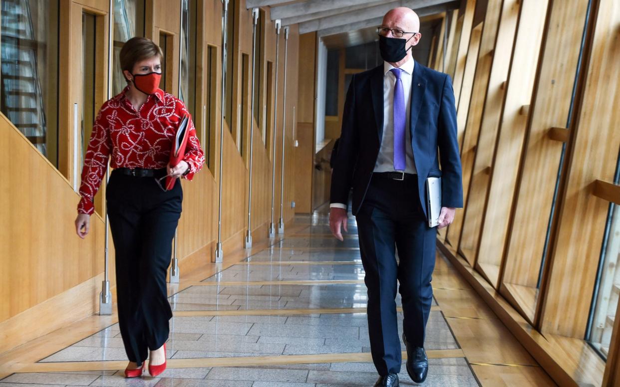 Nicola Sturgeon has been urged to remove John Swinney as Education Secretary -  Getty Images Europe