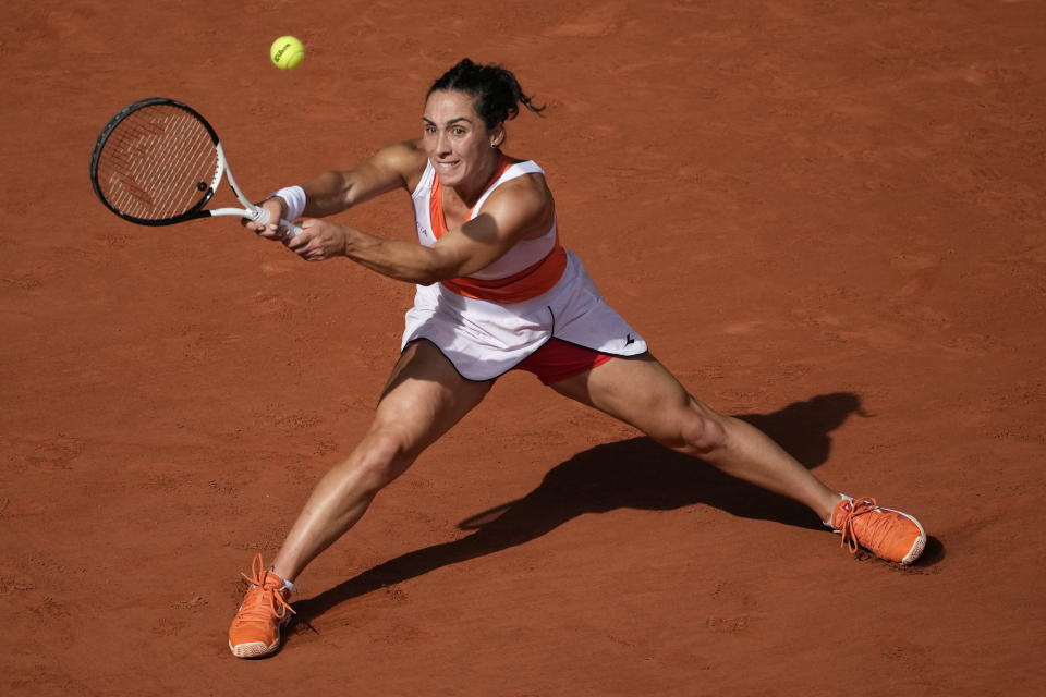 Italy's Martina Trevisan returns the ball to Coco Gauff of the U.S. during their semifinal match of the French Open tennis tournament at the Roland Garros stadium Thursday, June 2, 2022 in Paris. (AP Photo/Christophe Ena)