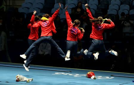 2016 Rio Olympics - Fencing - Victory Ceremony - Women's Epee Team Victory Ceremony - Carioca Arena 3 - Rio de Janeiro, Brazil - 11/08/2016. Romania celebrates winning the gold medal. REUTERS/Issei Kato