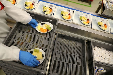 Meals are prepared by employees of LSG Group, Lufthansa's airline catering division, at the LSG headquarters in Frankfurt, Germany, November 11, 2016. REUTERS/Kai Pfaffenbach