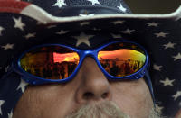 <p>Air Force One is reflected in a pair of sunglasses as President Donald Trump arrives to speak at his “Make America Great Again Rally” at Orlando-Melbourne International Airport in Melbourne, Fla., Saturday, Feb. 18, 2017. (AP Photo/Susan Walsh) </p>