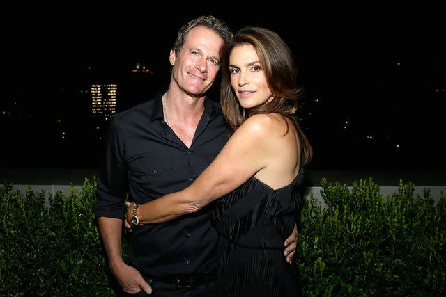 <p>Lars Niki/Getty</p> Rande Gerber and Cindy Crawford