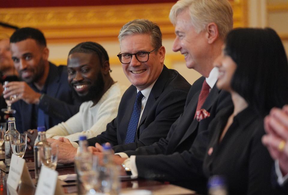 Sir Keir Starmer (centre) attending an event for The King's Trust to discuss youth opportunity, at St James's Palace in central London (PA)