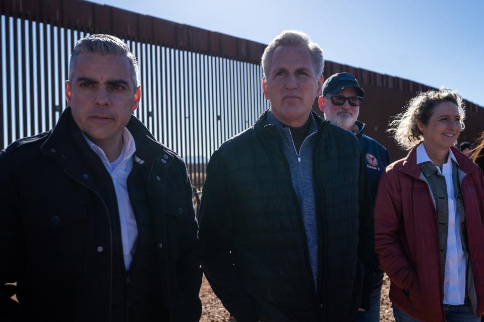 U.S. Rep. Juan Ciscomani (at left) and U.S. House Speaker Kevin McCarthy (right) answer questions from reporters during a news conference in front of the U.S.-Mexico border south of Sierra Vista on Feb. 16, 2023, in Hereford.