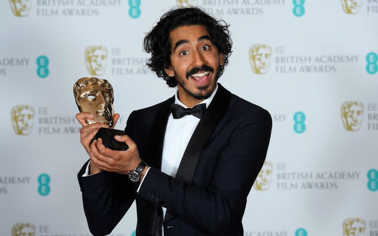 Dev Patel holds the award for best Supporting Actor, &#39;Lion&#39; at the British Academy of Film and Television Awards (BAFTA) at the Royal Albert Hall in London, Britain, February 12, 2017. (REUTERS/Toby Melville)