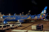 Air Alaska planes sit on the tarmac at the terminal, following an incident where an airline employee took off in an airplane, at Seattle-Tacoma International Airport in Seattle, Washington, U.S., August 10, 2018. REUTERS/Brendan McDermid