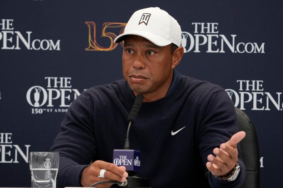 Tiger Woods talks with the media during a press conference prior to the 150th Open Championship at St. Andrews Old Course.