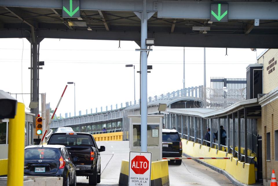 Motorists pay a bridge toll at Gateway International Bridge on Monday, March 6, 2023, in Brownsville, Texas, to cross into Matamoros, Mexico.