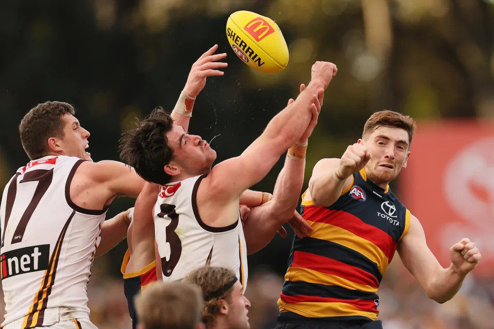 ADELAIDE, AUSTRALIA - JULY 28: Jai Newcombe of the Hawks competes with Mark Keane of the Crows during the 2024 AFL Round 20 match between the Adelaide Crows and the Hawthorn Hawks at Adelaide Oval on July 28, 2024 in Adelaide, Australia. (Photo by James Elsby/AFL Photos via Getty Images)