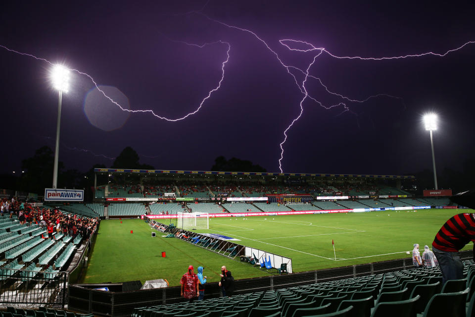 SYDNEY, AUSTRALIA – MARCH 11: Lightning strikes delay the start of play before the round 21 A-League match between the Western Sydney Wanderers and Melbourne City FC at Pirtek Stadium on March 11, 2015 in Sydney, Australia. (Photo by Matt King/Getty Images)