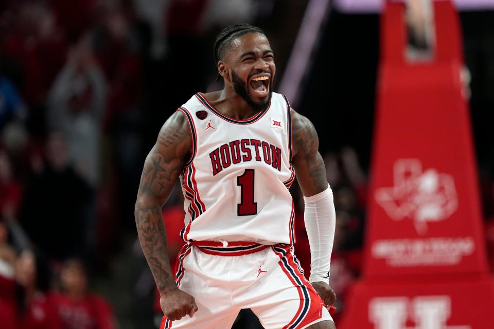 Houston's Jamal Shead (1) celebrates during the second half of an NCAA college basketball game against Iowa State Monday, Feb. 19, 2024, in Houston. Houston won 73-65. (AP Photo/David J. Phillip)