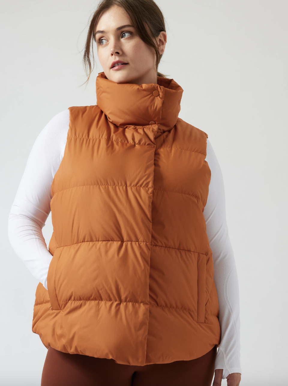 Downtown Vest in foliage orange (Photo via Athleta)