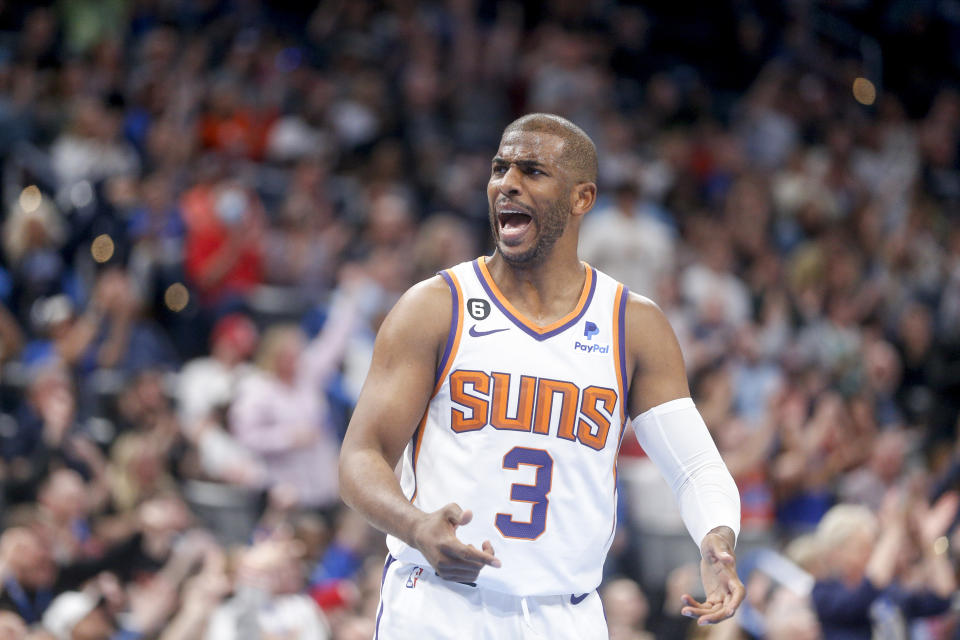 Chris Paul Wearing Phoenix Suns Jersey