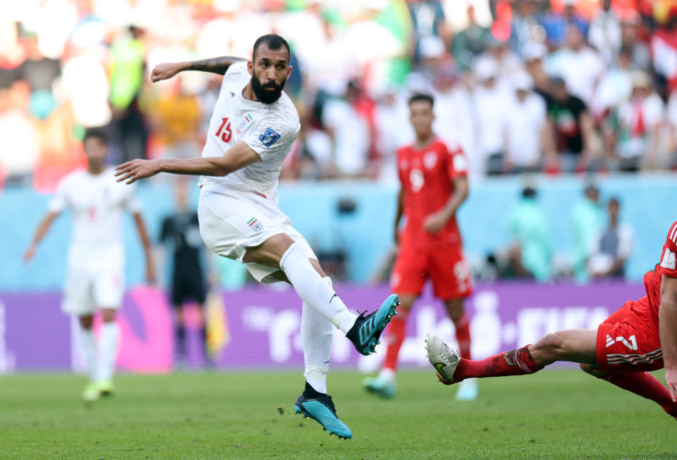 Roozbeh Cheshmi 在補時的世界波為伊朗射下本屆世界盃小組賽首勝。(Photo by Amin Mohammad Jamali/Getty Images)