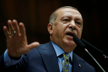 FILE PHOTO: Turkish President Tayyip Erdogan addresses members of parliament from his AK Party (AKP) in Ankara, Turkey, October 23, 2018. REUTERS/Tumay Berkin/File Photo