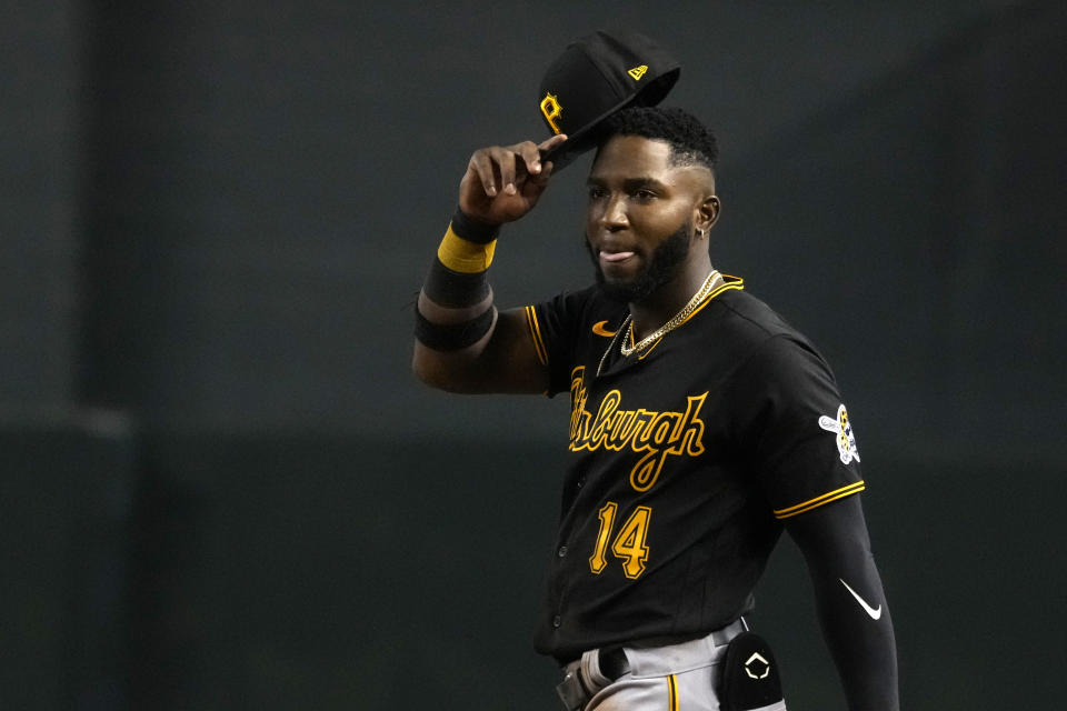 Pittsburgh Pirates' Rodolfo Castro reacts after making the last out against the Arizona Diamondbacks in the eighth inning of a baseball game, Tuesday, Aug. 9, 2022, in Phoenix. Called up from Triple-A Indianapolis before the game, Castro slid headfirst into third in the fourth inning against the Diamondbacks and had his phone fly out of his back pocket. (AP Photo/Rick Scuteri)