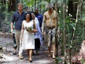 The Duke of Sussex attends a dedication ceremony of the forests of K'gari to the Queen's Commonwealth Canopy on Fraser Island, Queensland, Australia Monday, Oct. 22, 2018. The Duke and Duchess of Sussex took separate boats Monday to Queensland's Fraser Island as their tour of Australia and the South Pacific continued with a reduced schedule for the pregnant duchess. (Phil Noble/Pool Photo via AP)