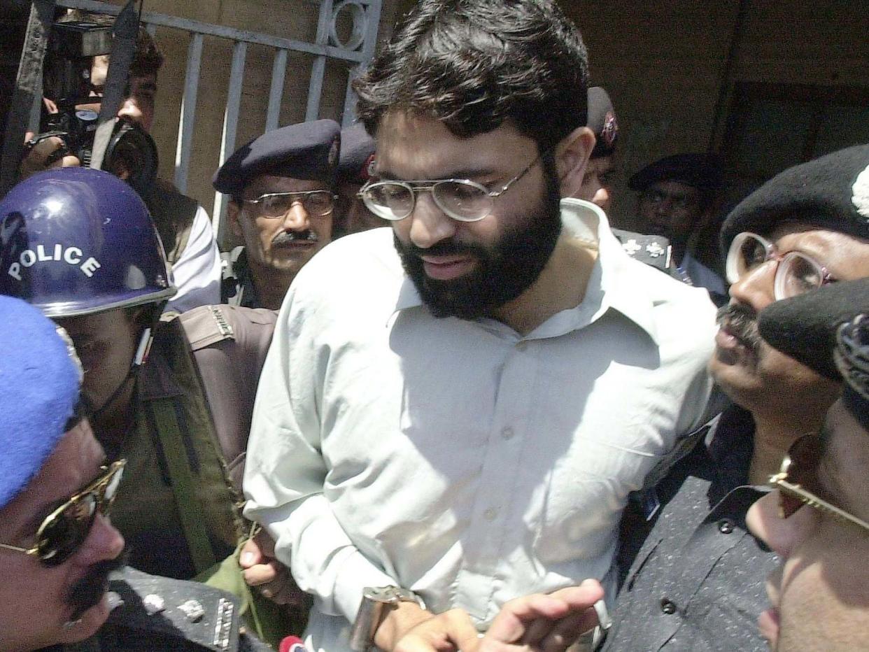 Omar Sheikh, pictured here in 2002, has had his death sentence overturned for his role in Daniel Pearl's kidnapping and murder: AFP via Getty Images