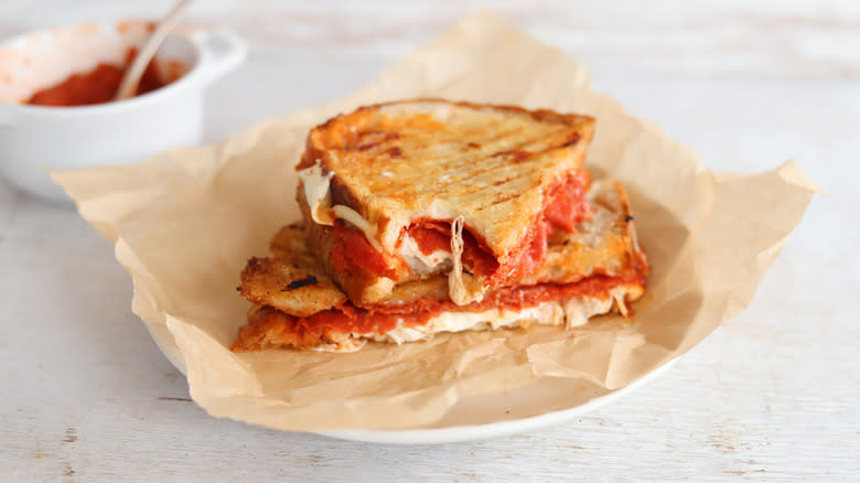 pepperoni pizza panini on sandwich paper