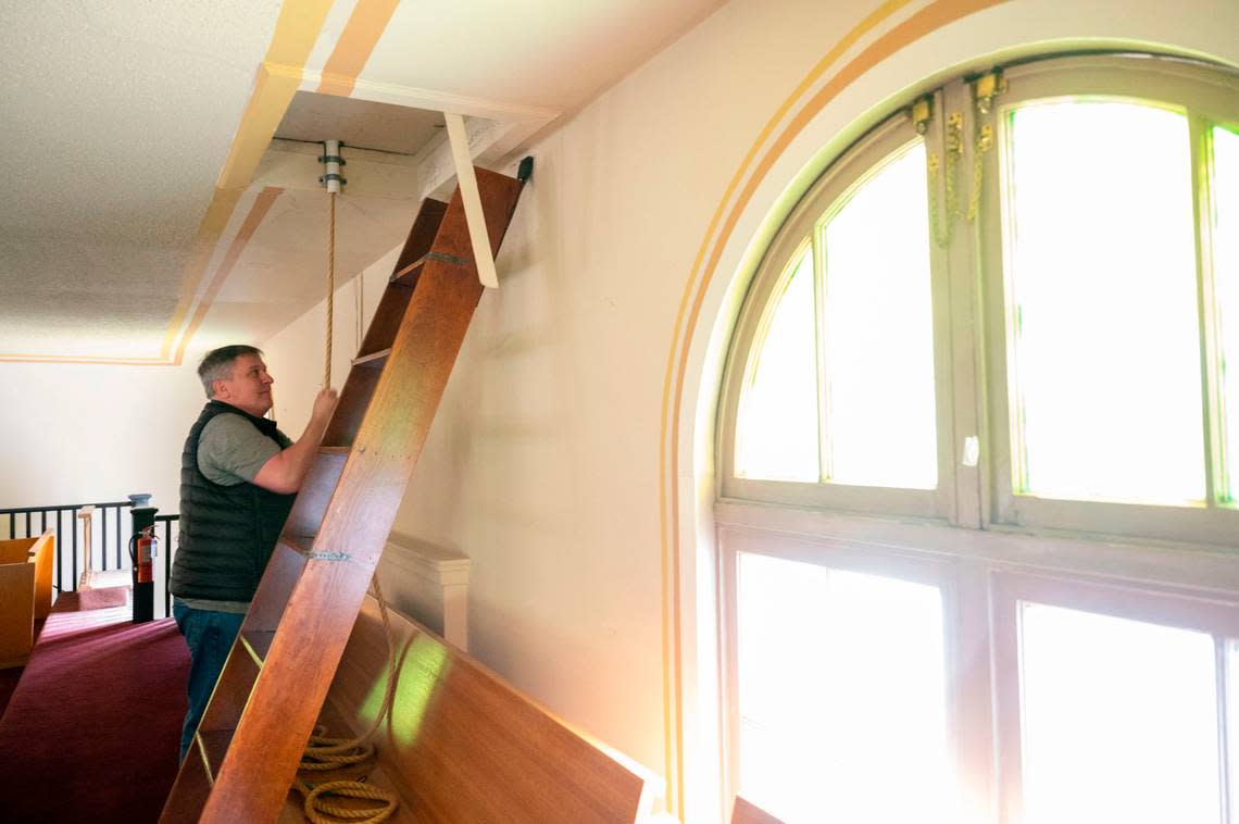 Dave Viafore rings the church bell honoring Father Ron Knudsen’s 50th anniversary of his ordination which was also coincidentally the final mass at St. Rita of Cascia on Wednesday, June 8, 2022, in Tacoma.