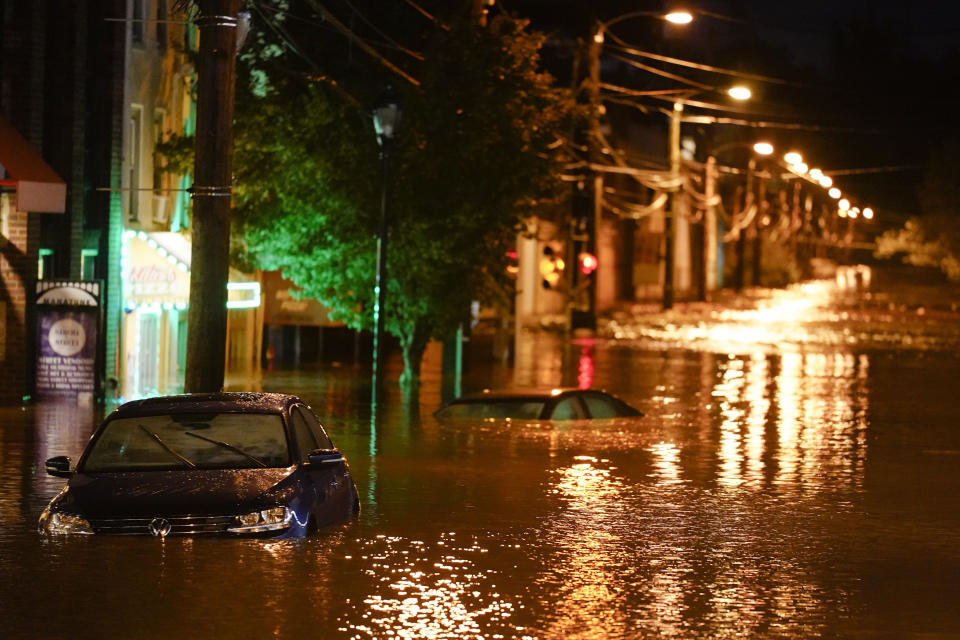 FILE - The Manayunk neighborhood in Philadelphia is flooded Thursday, Sept. 2, 2021, in the aftermath of downpours and high winds from the remnants of Hurricane Ida. La Nina, the natural but potent weather event linked to more drought and wildfires in the western United States and more Atlantic hurricanes, is becoming the nation’s unwanted weather guest and meteorologists said the West’s megadrought won’t go away until La Nina does. (AP Photo/Matt Rourke, File)