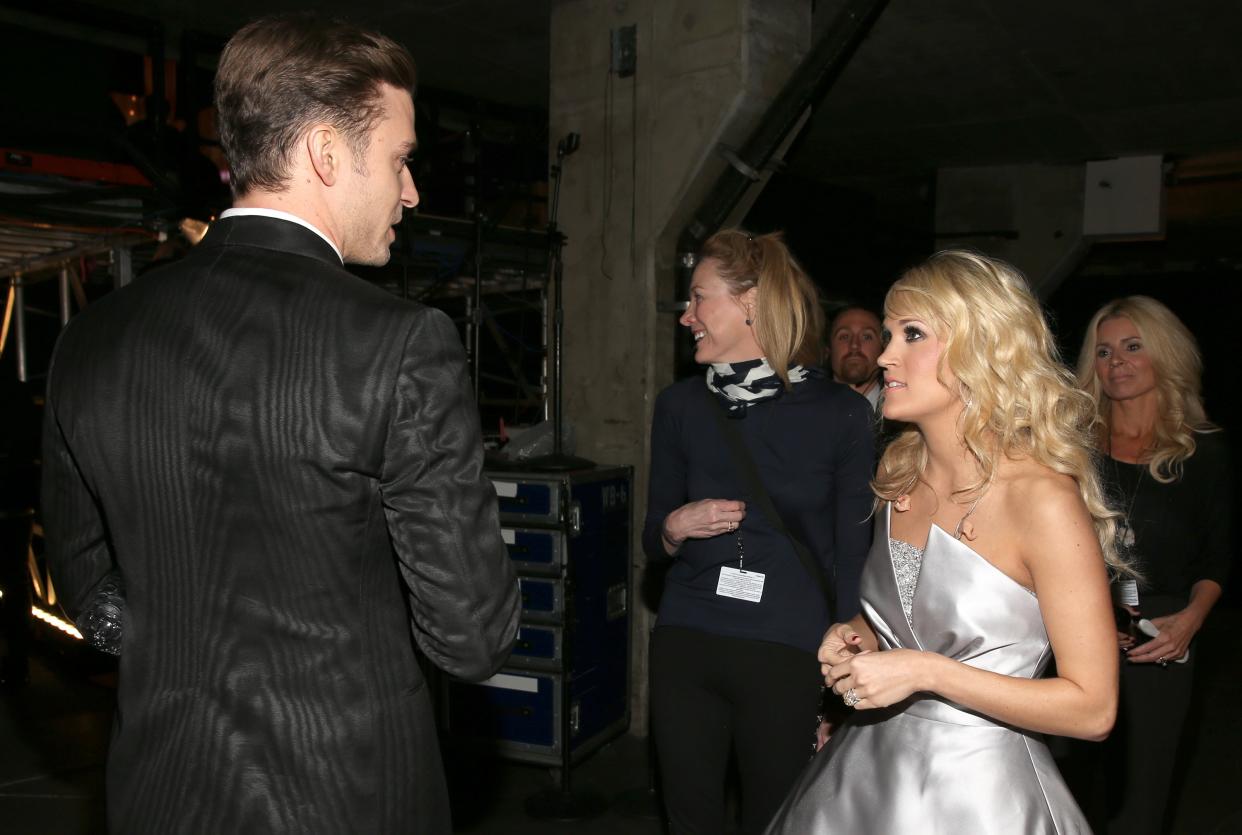 Singers Carrie Underwood and Justin Timberlake backstage during the 55th Annual Grammy Awards at the Staples Center on Feb. 10, 2013, in Los Angeles. (Photo: Christopher Polk/Getty Images for NARAS)