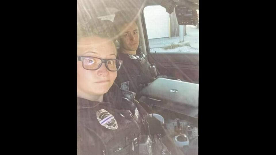 Kaitlyn Lauritsen and Jonah Oswald pose for a selfie while officers at the Buckner Police Department, after Oswald joined the force in 2018.