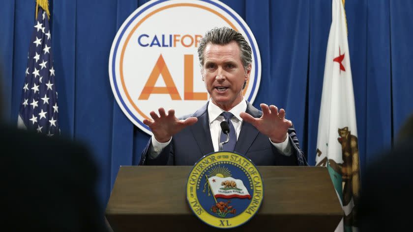 Gov. Gavin Newsom discusses his revised 2019-2020 state budget during a news conference Thursday, May 9, 2019, in Sacramento, Calif. Newsom, a Democrat, has proposed a $213.5 billion a spending plan. (AP Photo/Rich Pedroncelli)