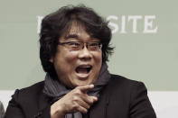 Bong Joon-ho, director of Oscar-winning “Parasite,” gestures during a press conference in Seoul, South Korea, Wednesday, Feb. 19, 2020. Bong said Wednesday “the biggest pleasure and the most significant meaning” that the film has brought to him was its success in many countries though the audiences might feel uncomfortable with his explicit description of a bitter wealth disparity in modern society. (AP Photo/Ahn Young-joon)