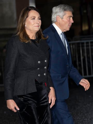 <p>Mark Cuthbert/UK Press/Getty</p> Carole and Michael Middleton attend Kate Middleton's Christmas concert on Dec. 8, 2023