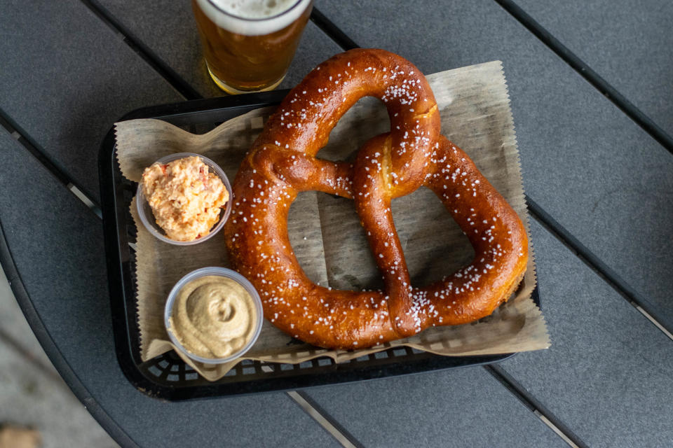 Pretzel with pimento cheese at Against the Grain Public House.