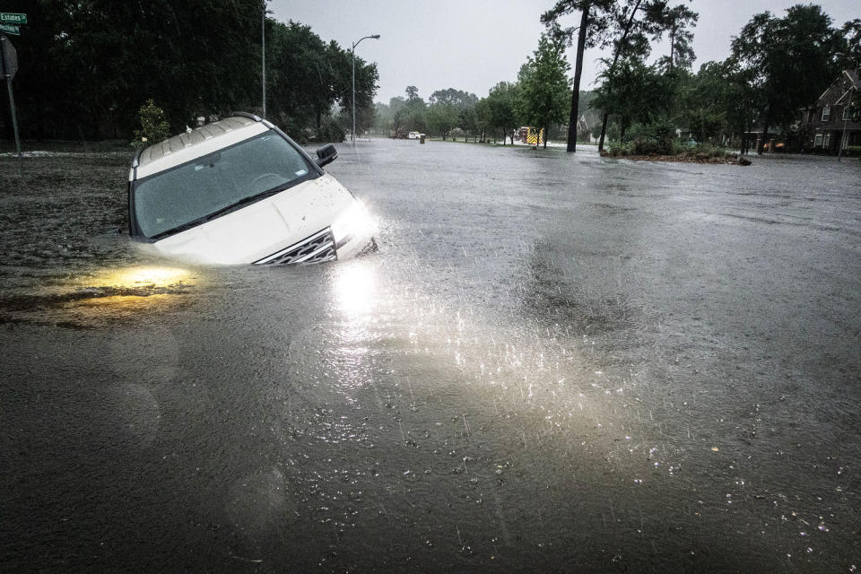 A car is stranded after severe flooding in Spring, Texas, on May 2, 2024. (Brett Coomer / Houston Chronicle via Getty Images)