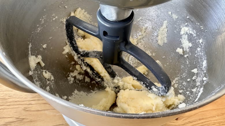 Beating butter and sugar in mixing bowl