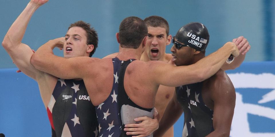 American swimmers celebrate winning the 4x100 meter freestyle at the 2008 Olympics.