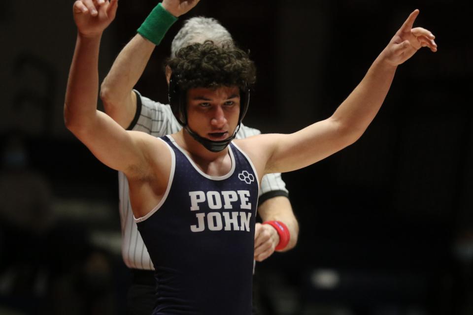 Jason Athey of Pope John defeated Race Fonte of Mendham by points in the 120 lb. match as Pope John wrestled Mendham on January 5, 2022 at Mendham.