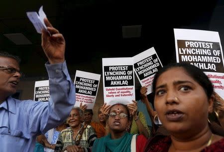 Demonstrators shout slogans as they carry placards during a protest against the killing of Mohammed Akhlaq, in Mumbai, October 6, 2015. REUTERS/Shailesh Andrade