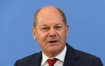 German Finance Minister Olaf Scholz attends a news conference in Berlin