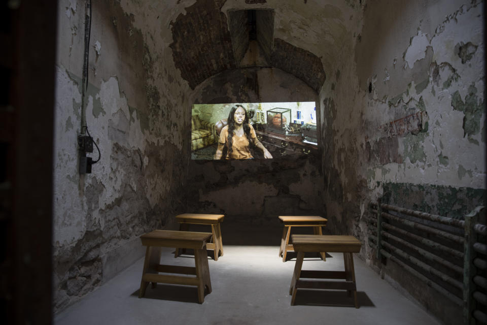 A video installation by filmmaker Dehanza Rogers' titled #BlackGirlhood is shown at the Eastern State Penitentiary, Thursday, May 2, 2019, which is now a museum in Philadelphia,. (AP Photo/Matt Rourke)