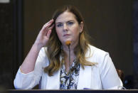 Jessica Hawkins, senior director of prevention services with the Oklahoma Department of Mental Health and Substance Abuse Services, testifies during the opioid trial Monday, June 24, 2019 in Norman, Okla. (AP Photo/Sue Ogrocki, Pool)