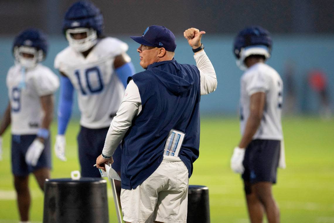 North Carolina defensive coordinator Geoff Collins works with his players during the Tar Heels’ first practice of the season on Monday, July 29, 2024 in Chapel Hill, N.C.