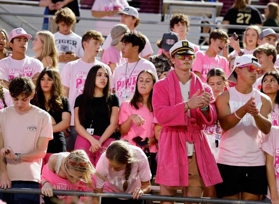 Mansfield students decked out in Pink for Cancer awareness in the first half of a UIL high school football game at Vernon Newsom Stadium in Mansfield, Texas, Thursday, Oct. 12, 2023.