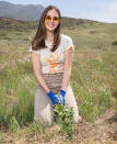 <p>Alison Brie plants a tree as part of the Planet Oat Project to support reforestation in honor of Earth Day in Malibu.</p>