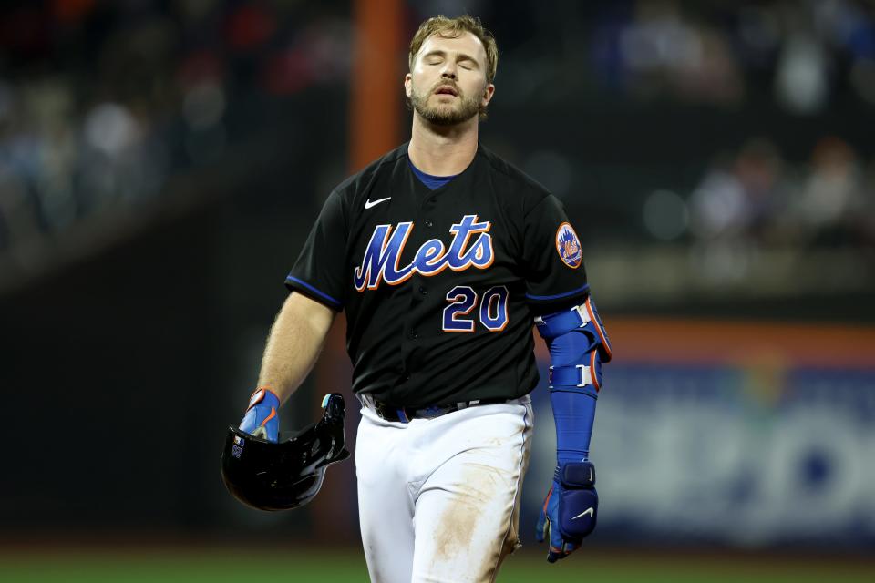 May 13, 2022; New York City, New York, USA; New York Mets first baseman Pete Alonso (20) reacts after flying out to the wall against the Seattle Mariners during the eighth inning at Citi Field. Mandatory Credit: Brad Penner-USA TODAY Sports