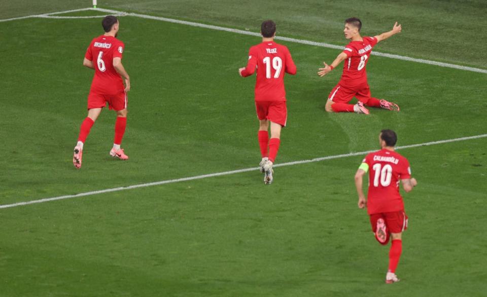 Guler celebrates after scoring for Turkey (Getty Images)