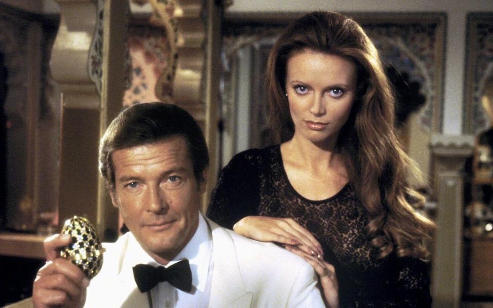 Roger Moore and Kristina Wayborn in Octopussy - Credit: Allstar Picture Library