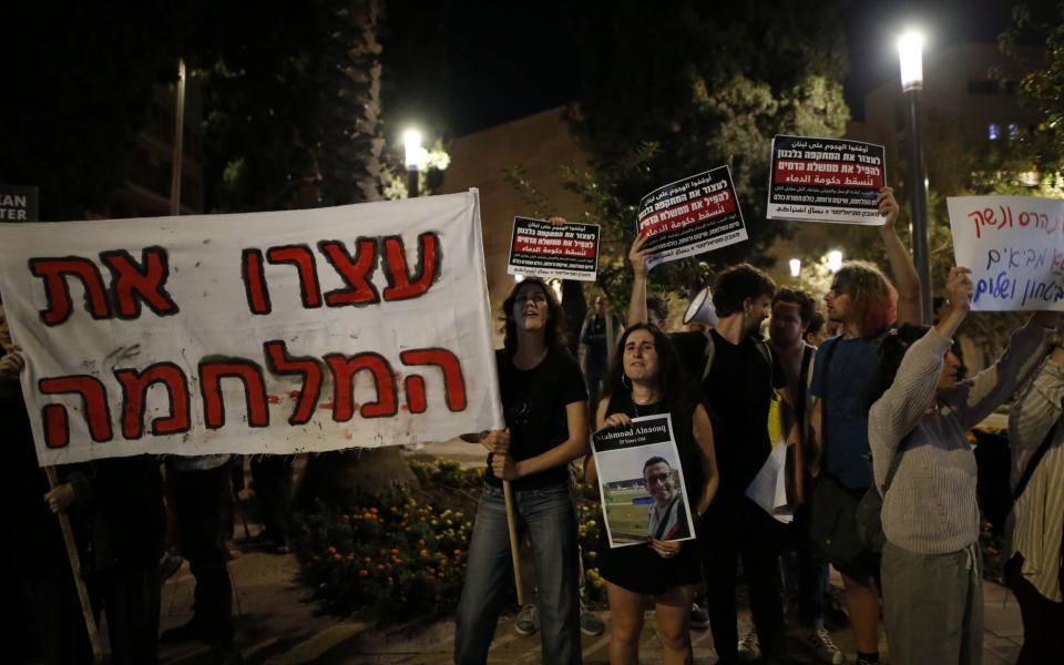 Protesters in Tel Aviv gather to condemn the actions of Benjamin Netanyahu in failing to agree a ceasefire in Gaza